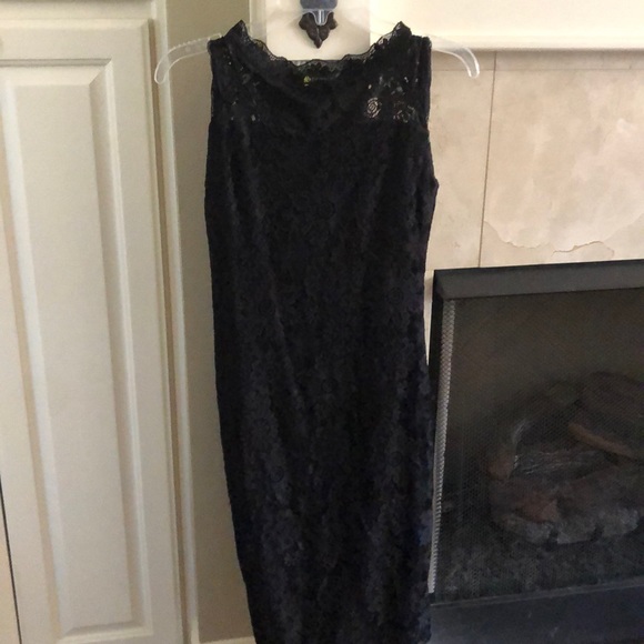 Size small, fitted black lacy dress. - Picture 1 of 4